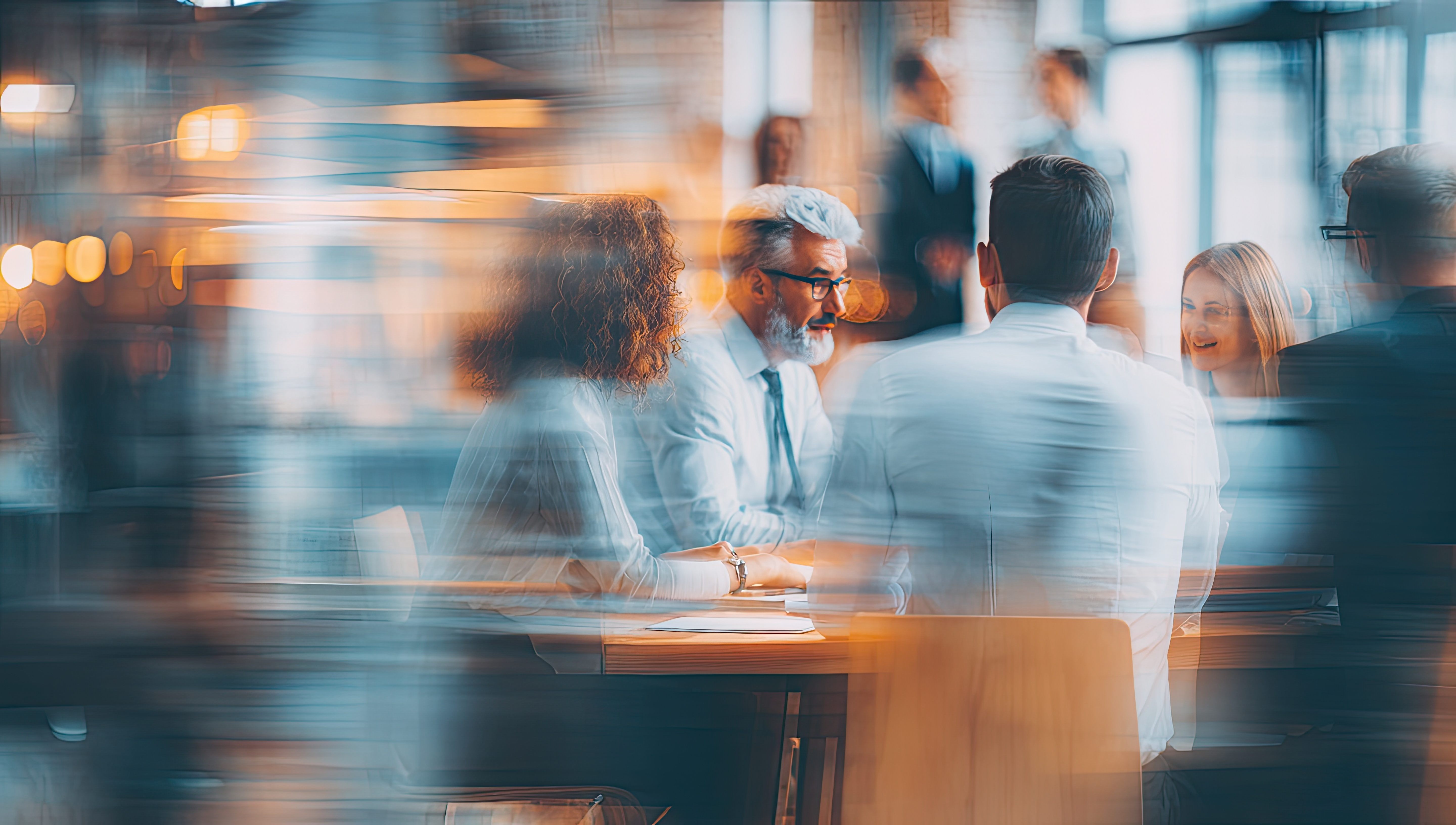People in office meeting with blurrred effect